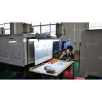 Plastic factory: Molding machine with friendly operator